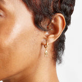 Gold Peace Huggie Earrings